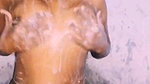 brown aunty bathing