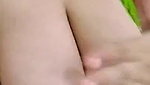 Sexy busty beauty showing her assets