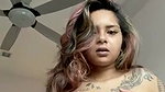 beautiful tattoed girl showing her boobies