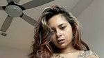 beautiful tattoed girl showing her boobies