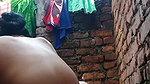 village Bhabhi bathing nude in open backyard