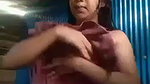 cute slum girl recording her own dress change