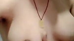 Desi girl making video of her cute boobs in bathroom