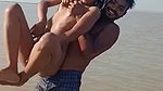 enjoying with busty Desi slut in river