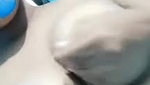 cute girl showing her big round boobs