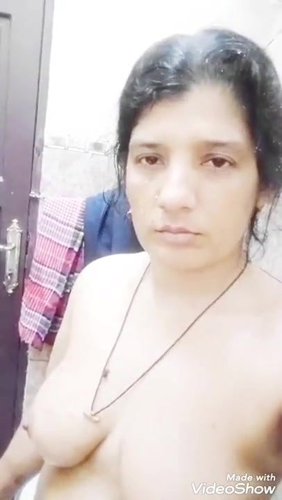 cute Indian housewife making her own nude video