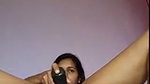 inserting dildo into pussy