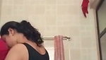Indian girl dancing in the bathroom
