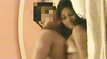 Hot couple enjoying sex on the bed and listening music