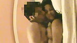Hot couple enjoying sex on the bed and listening music