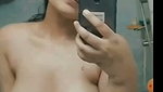 Hot  sexy girl showing her boobs in bathroom
