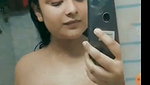Hot  sexy girl showing her boobs in bathroom