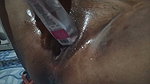 Aunty putting dabur rose wate in her pussy