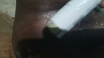 Aunty applying oil in her pussy for dilo