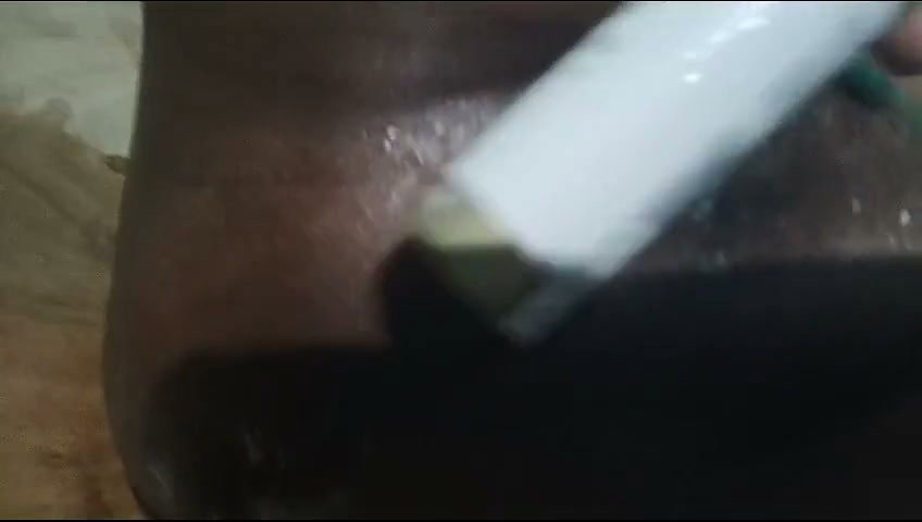 Aunty applying oil in her pussy for dilo