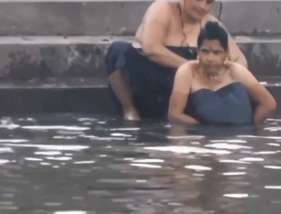 Both sisters outdoor bathing enjoying
