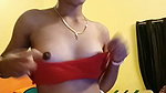 Sexy slim girl showing her boobs