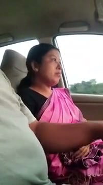 Mature aunty sucking dick on runing car