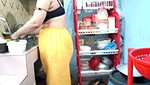Hot girl working on kitchen and show her huge boobs