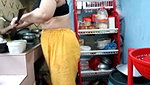 Hot girl working on kitchen and show her huge boobs