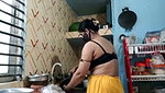 Hot girl working on kitchen and show her huge boobs