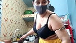 Hot girl working on kitchen and show her huge boobs