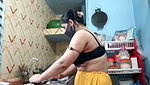 Hot girl working on kitchen and show her huge boobs