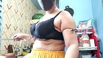 Hot girl working on kitchen and show her huge boobs