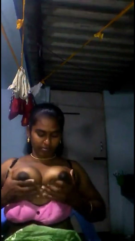 Tamil Aunty pressing and rubing her boobs