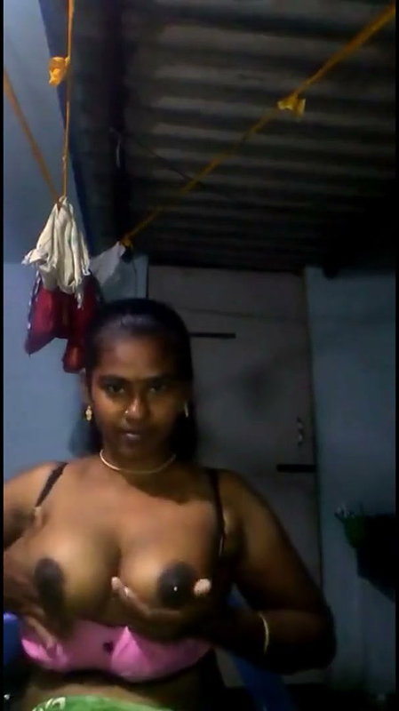 Tamil Aunty pressing and rubing her boobs