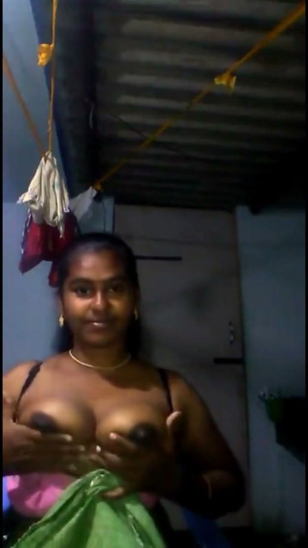 Tamil Aunty pressing and rubing her boobs