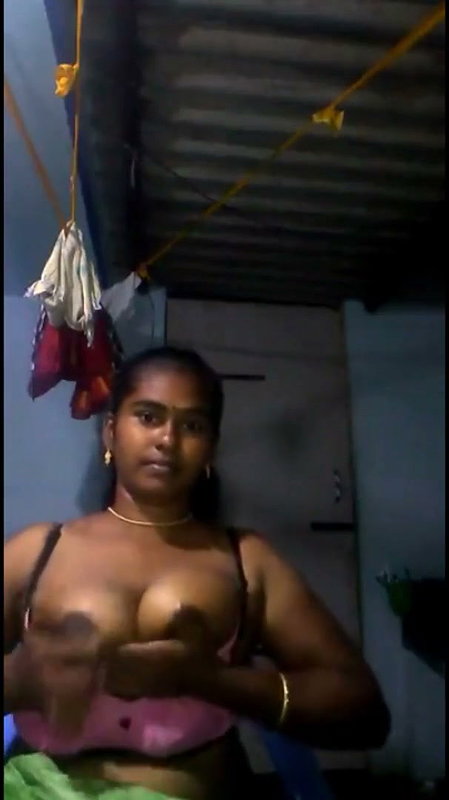 Tamil Aunty pressing and rubing her boobs