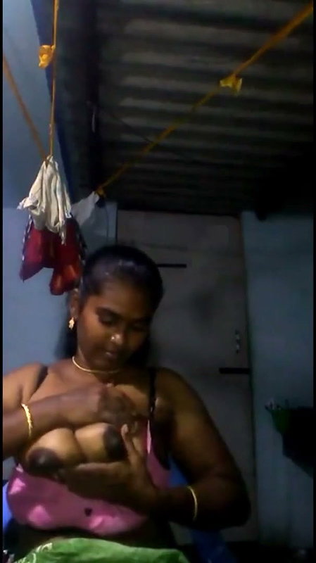 Tamil Aunty pressing and rubing her boobs