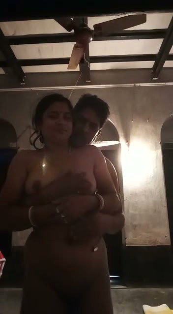 Village couple enjoying  showing