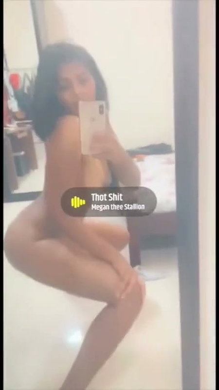 Sexy girl express her nude body in mirror