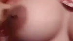 Sexy girl playing with her boob