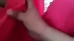 Boyfriend pressing girlfriend boob outdoor