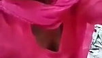 Boyfriend pressing girlfriend boob outdoor