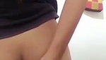 Slim sexy girl putting plastic tube in her pussy