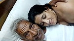 Mature couple enjoying in hotel room
