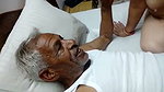 Mature couple enjoying in hotel room