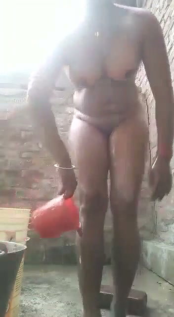 Village girl bathing show her hot figure
