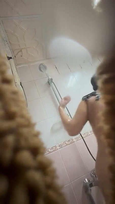 Awesome looking aunty taking bath