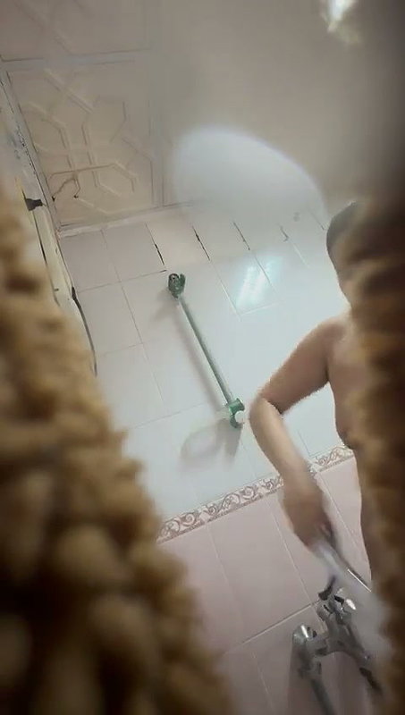 Awesome looking aunty taking bath