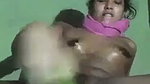 Sexy girl putting plastic bottle to drill her pussy