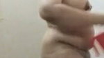 Mature aunty bathing