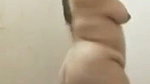 Mature aunty bathing