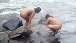 Two bhabhi talking bath in open area