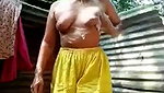 Village beautiful girl bathing outdoor  showing