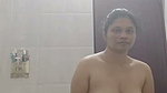 Sexy lady showing her hot figure in bathroom